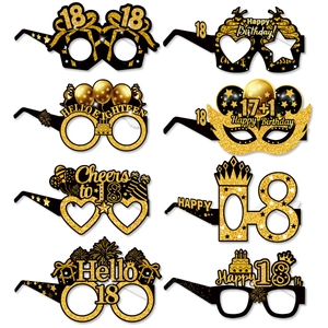 Set of 8 glittery black and gold 18th birthday party paper glasses with funny designs