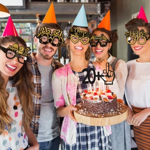 Black and gold 21st birthday party glasses and cake topper set for celebration events