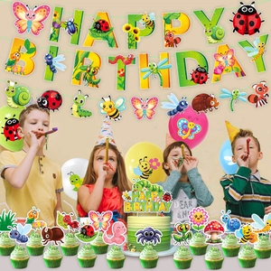Detail of insect theme birthday party kit with colorful banners, toppers and latex balloons