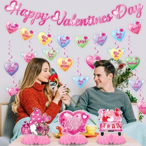 Valentine's Day decoration set with banner, heart charms, and honeycomb centerpieces