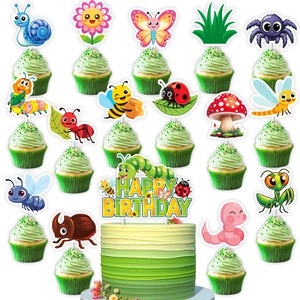 Close-up of insect theme cupcake toppers including butterflies and happy birthday sign