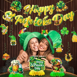 St. Patrick's Day party set with shamrock banner, honeycomb centerpieces and green hats
