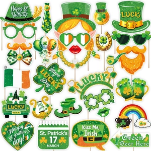 St. Patrick's Day photo booth props set with shamrock hats, glasses and lucky signs