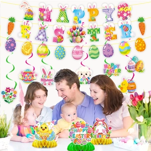 Family decorating with Happy Easter banners, spiral hanging eggs and bunny table centerpieces