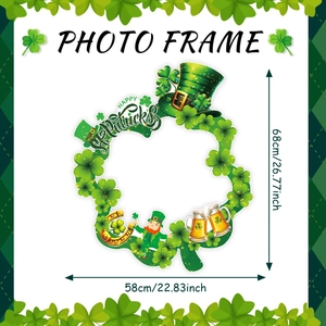 Detailed view of Saint Patrick's Day photo booth frame with shamrock and gnome motifs