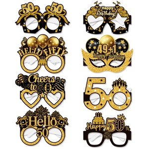 Detail of 8-piece set of 50th birthday paper party glasses in black and gold glitter