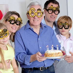 Detailed set of 60th birthday party glasses in black and gold for family celebrations
