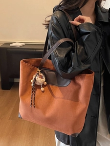 Large vintage caramel suede tote bag with leather straps and plush lion charm for women