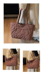 Detail view of brown quilted tote bag showing large capacity and wave texture