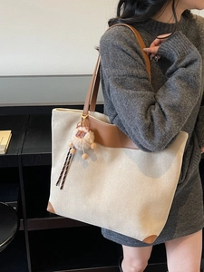 Retro faux suede beige tote bag with brown leather trim and plush lion charm detail