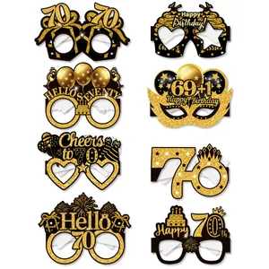 Set of 8 black and gold 70th birthday party glasses with glitter accents and festive designs