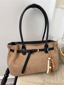 Vintage brown suede tote bag with leather strap and decorative beaded tassel charm