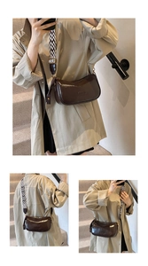 Detail of a dark brown glossy leather crossbody bag with a stylish chevron woven strap