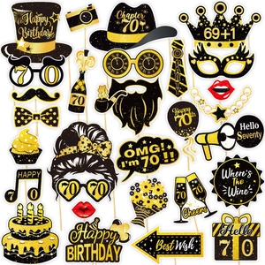 Detailed set of black and gold 70th birthday photo booth props with glitter finish