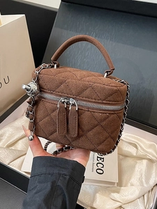 Brown quilted faux suede mini handbag with silver chain strap and top handle in gift box