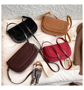 Maillard saddle bags in suede leather finish with various autumn colors and shoulder straps
