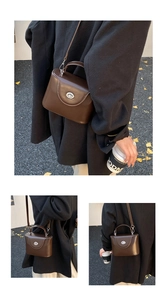 Détails du sac boîte vintage en cuir mat avec fermoir rotatif argenté élégant