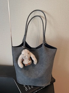 Dark grey woven tote bag with plush bunny charm, stylish large capacity shoulder handbag