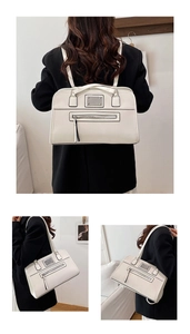 Detailed views of the white vintage tote bag showing carrying styles and side zipper pocket