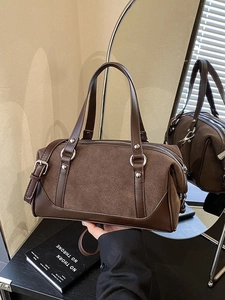 Brown vintage Boston bag in patchwork leather with double handles and silver hardware