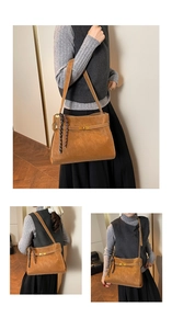 Dettaglio della borsa tote caramello con chiusura dorata, cuciture e foulard in seta