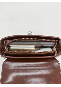 Internal view showing three compartments and heart-shaped lock of the brown PU shoulder bag