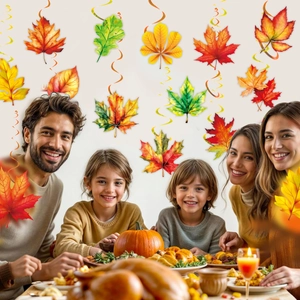 Thanksgiving hanging swirl decorations with colorful maple leaves in a cozy family dinner setting