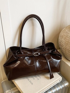 Retro dark brown oily leather tote bag with silver buckle and sleek shoulder straps