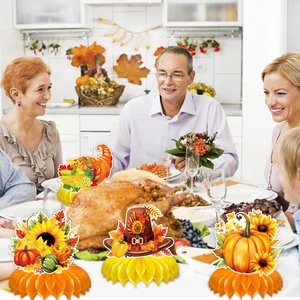 Thanksgiving honeycomb centerpieces with pumpkin and turkey designs for autumn party tables