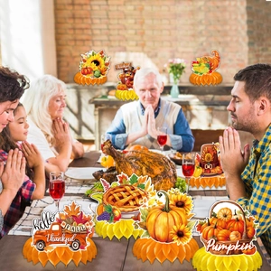 Detail view of Thanksgiving honeycomb centerpieces with pumpkins, turkeys and fall leaves