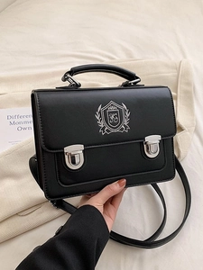 Retro black crossbody messenger bag with embroidered shield badge and silver metal lock