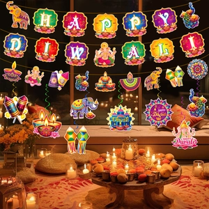 Detail of Happy Diwali banner and Indian festive hanging swirls for indoor party decor