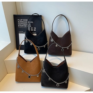 Chic slouchy tote bags in four colors with decorative silver chains and pendants