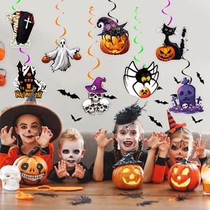 Halloween hanging swirl decorations featuring pumpkins, ghosts, and colorful party streamers