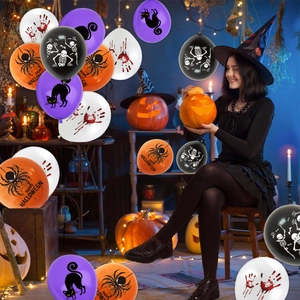 Halloween balloons with blood prints, spiders and skeletons for festive party decoration