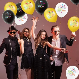 Detail of 2026 Happy New Year balloons in black gold and white for party decorations