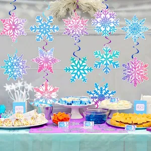 Glittery snowflake hanging swirls for winter party decorations in blue and purple