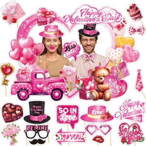 Variety of Valentine's Day photo booth props including heart frames and party paper masks