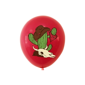 Detail view of red latex balloon with western cowboy cactus and skull print