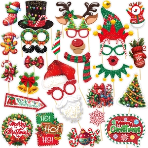 Detailed 25-piece Christmas photo booth props set including Santa hats and reindeer antlers
