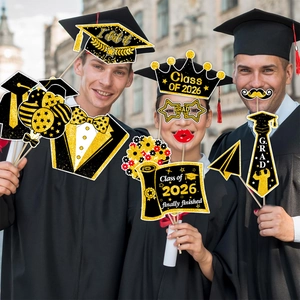 Class of 2026 graduation photo booth props with black and gold glitter fun accessories