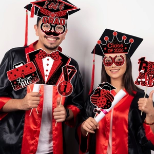 Class of 2026 graduation photo booth props with red and black doctoral hat designs