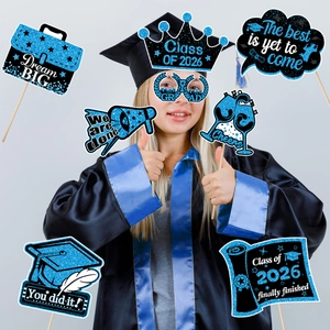 Close-up of 2026 graduation photo props with blue glitter finish and wooden sticks