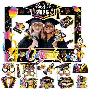 Class of 2026 graduation party photo booth props with colorful frame and funny handheld signs