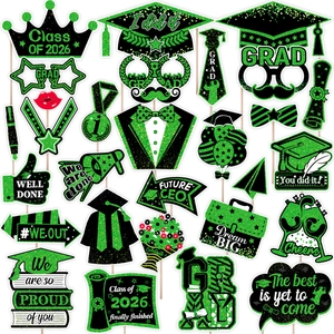 Detailed Class of 2026 graduation party photo props in glittery green and black