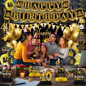 Detailed set of 40th birthday decorations featuring black and gold balloons and banners