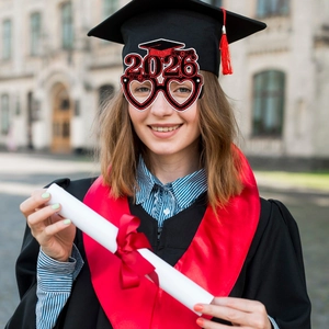 2026 graduation party paper glasses with glitter heart frames and school graduation motifs