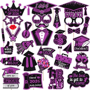 Detail of Class of 2026 graduation photo props in purple and black glitter style