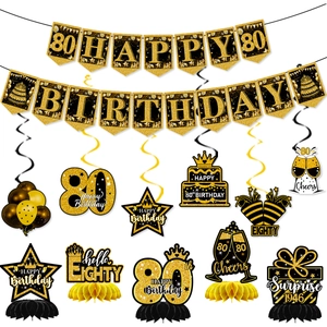 Dettagli decorazioni 80 anni nero e oro con striscioni glitterati e pendenti a spirale