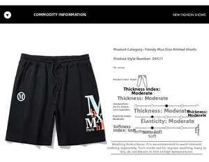Detail of white M Paris logo print on black cotton wide-leg athletic shorts